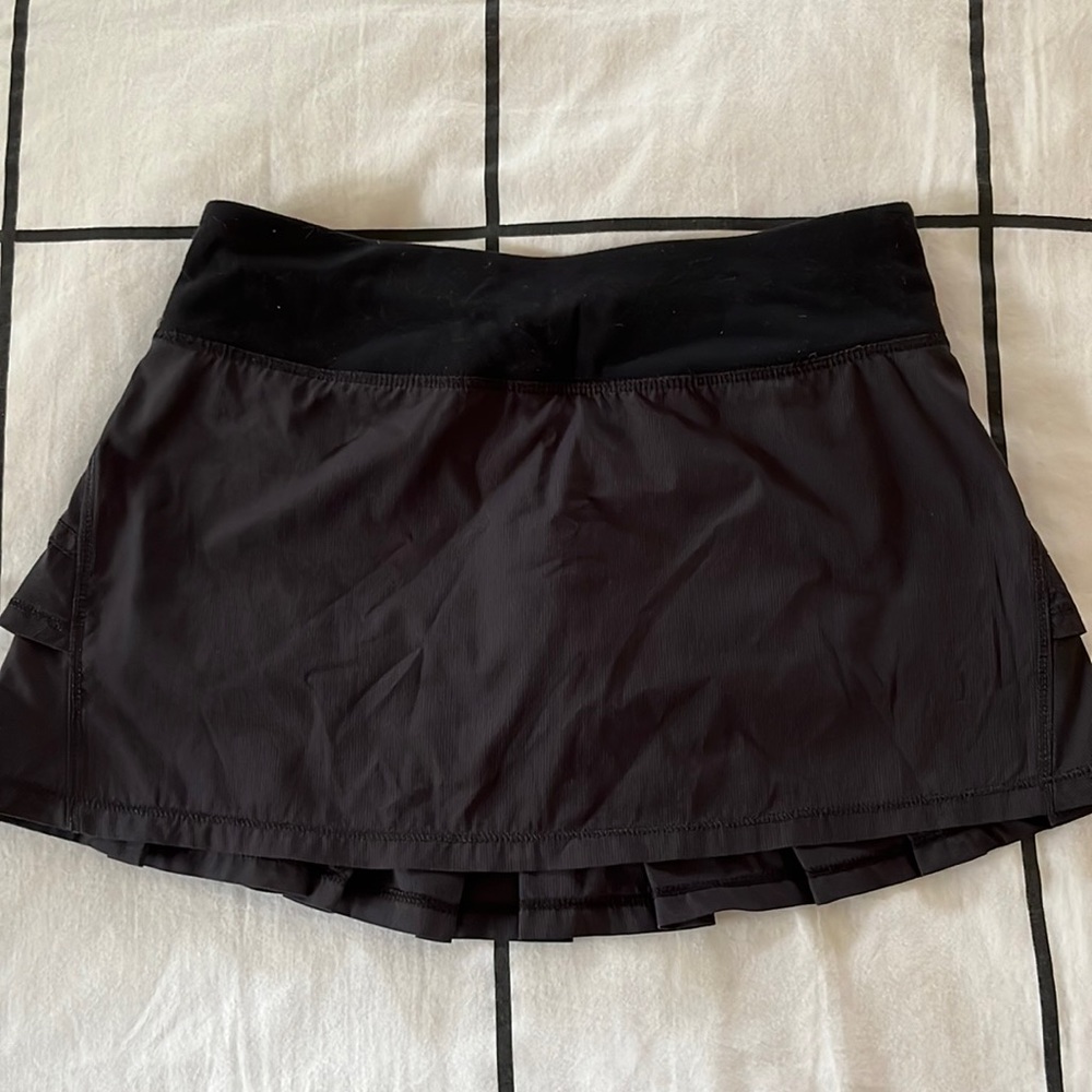 ivivva black athletic skirt with spandex under the skirt.